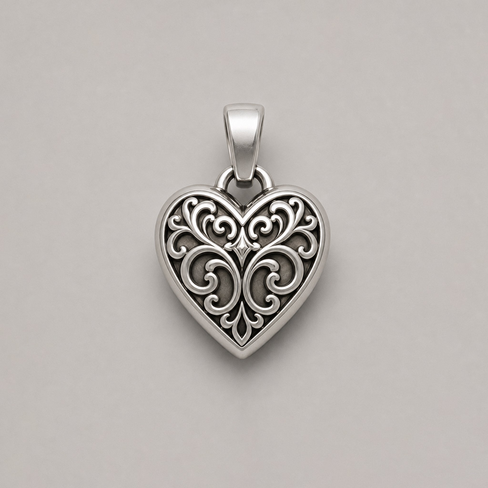 THE FILIGREE HEART PENDANT – STERLING SILVER