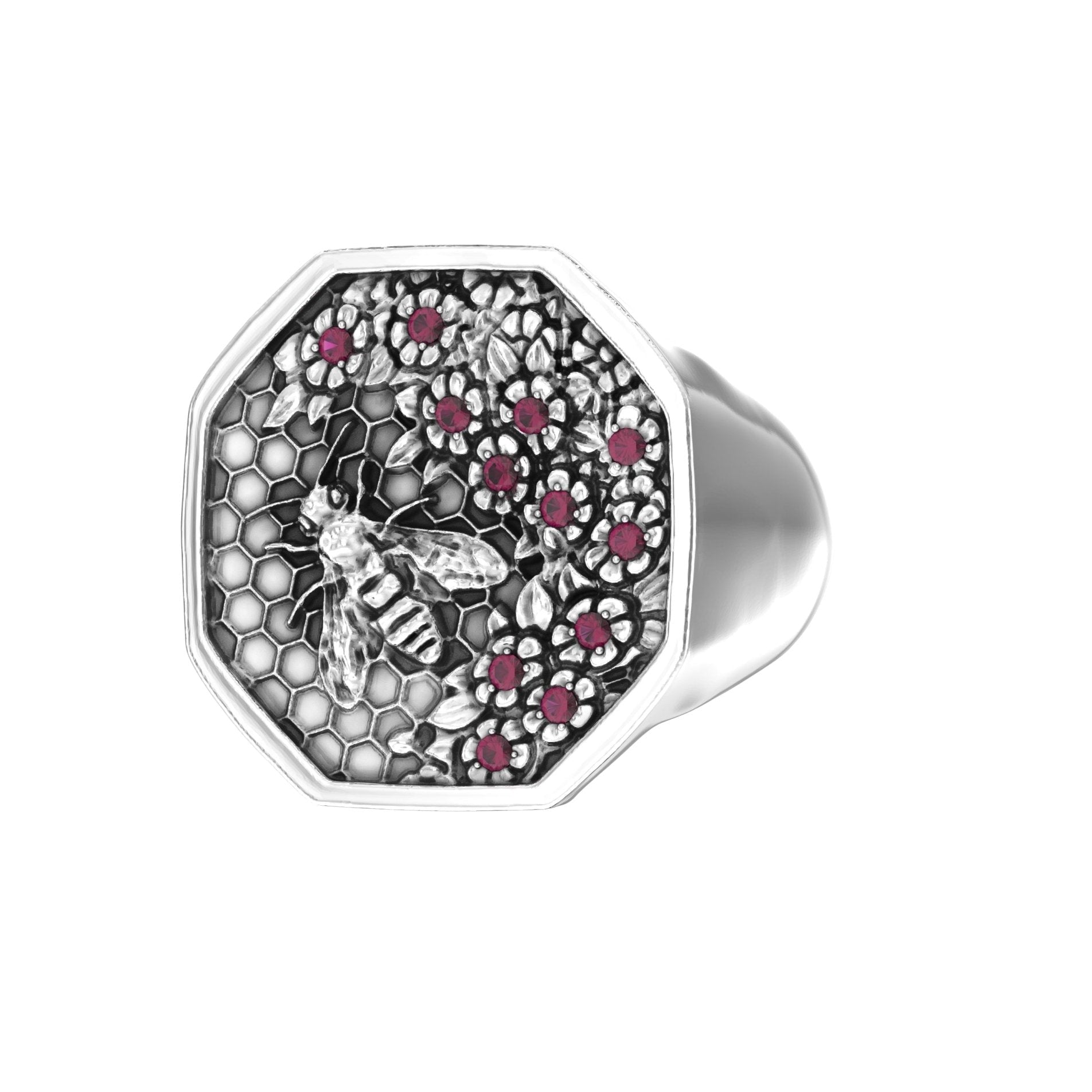 Angled right view of sterling silver signet ring featuring bee motif and ruby accents