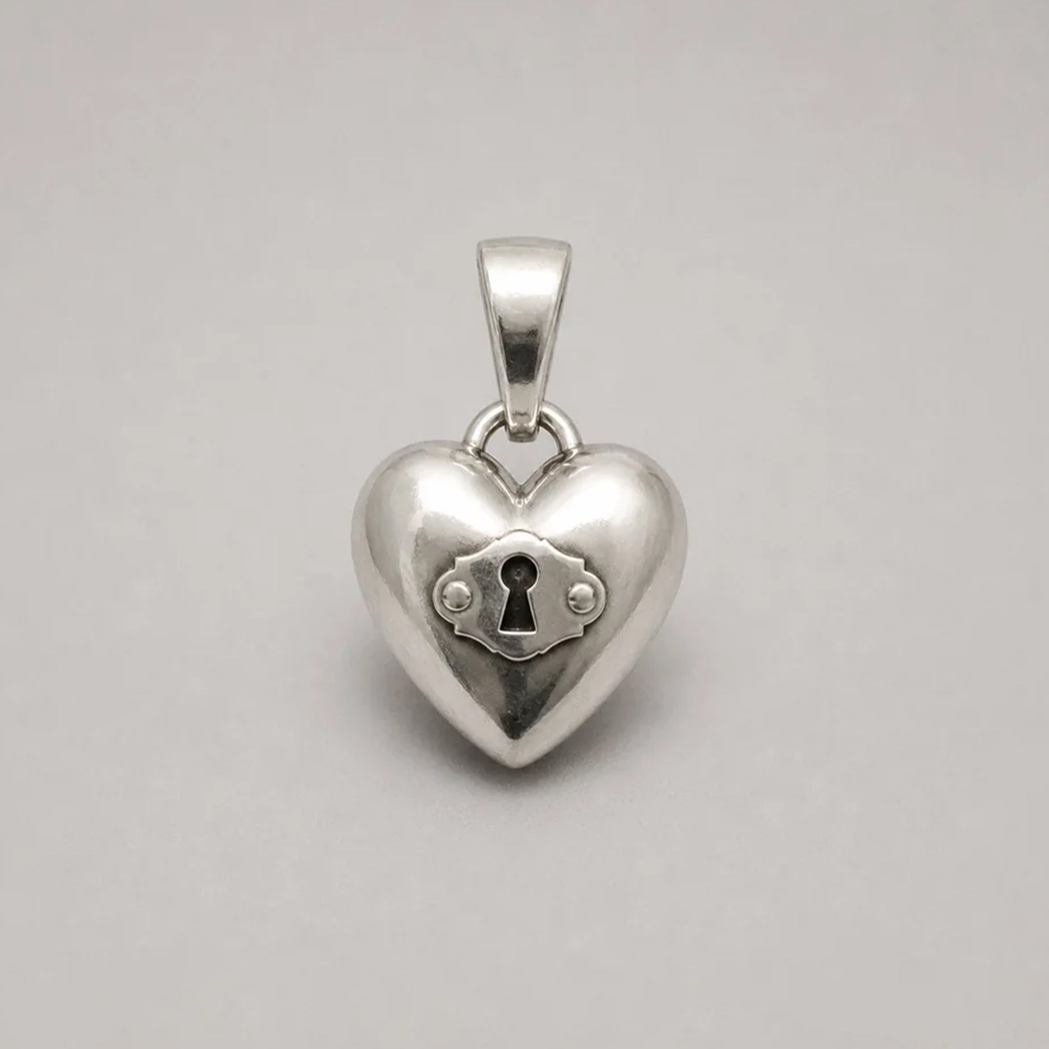 THE LOVE LOCKED PENDANT – STERLING SILVER