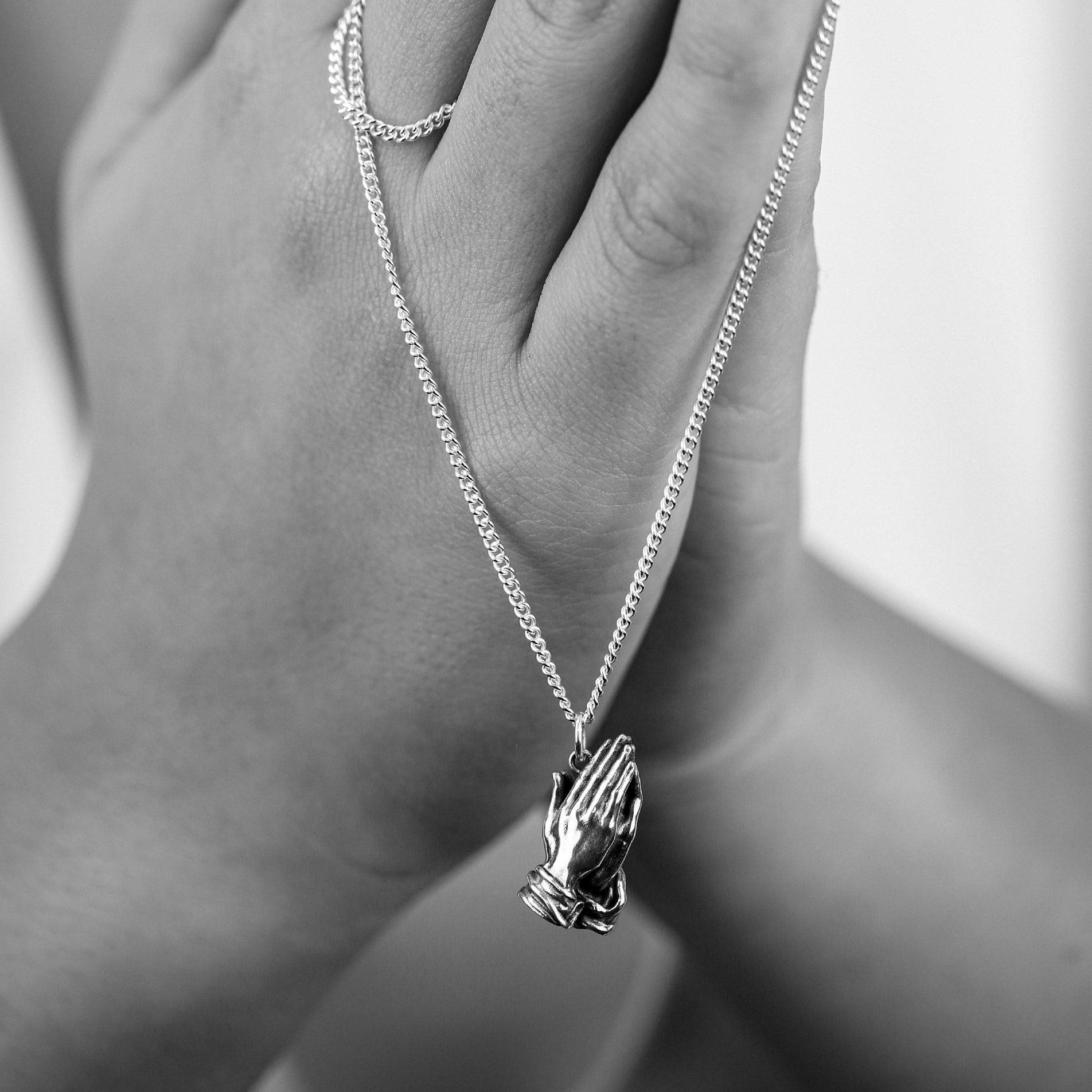 Prayer In Hand Necklace in Sterling Silver – Symbolic Pendant for Strength & Reflection - BeckonJewel
