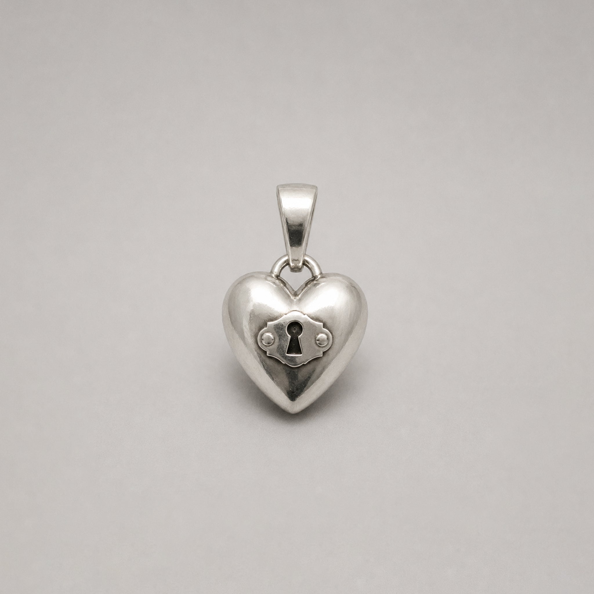 THE LOVE LOCKED PENDANT – STERLING SILVER